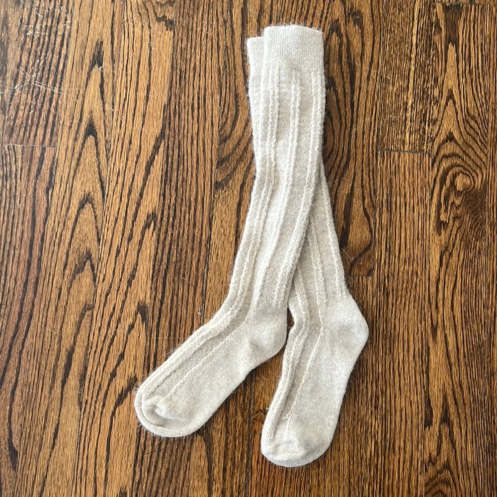 Brand new, knee high socks. Never worn, extremely soft, fits women’s size 5-7.